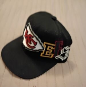 Mitchell & Ness Black Snapback Hat with Red Brim